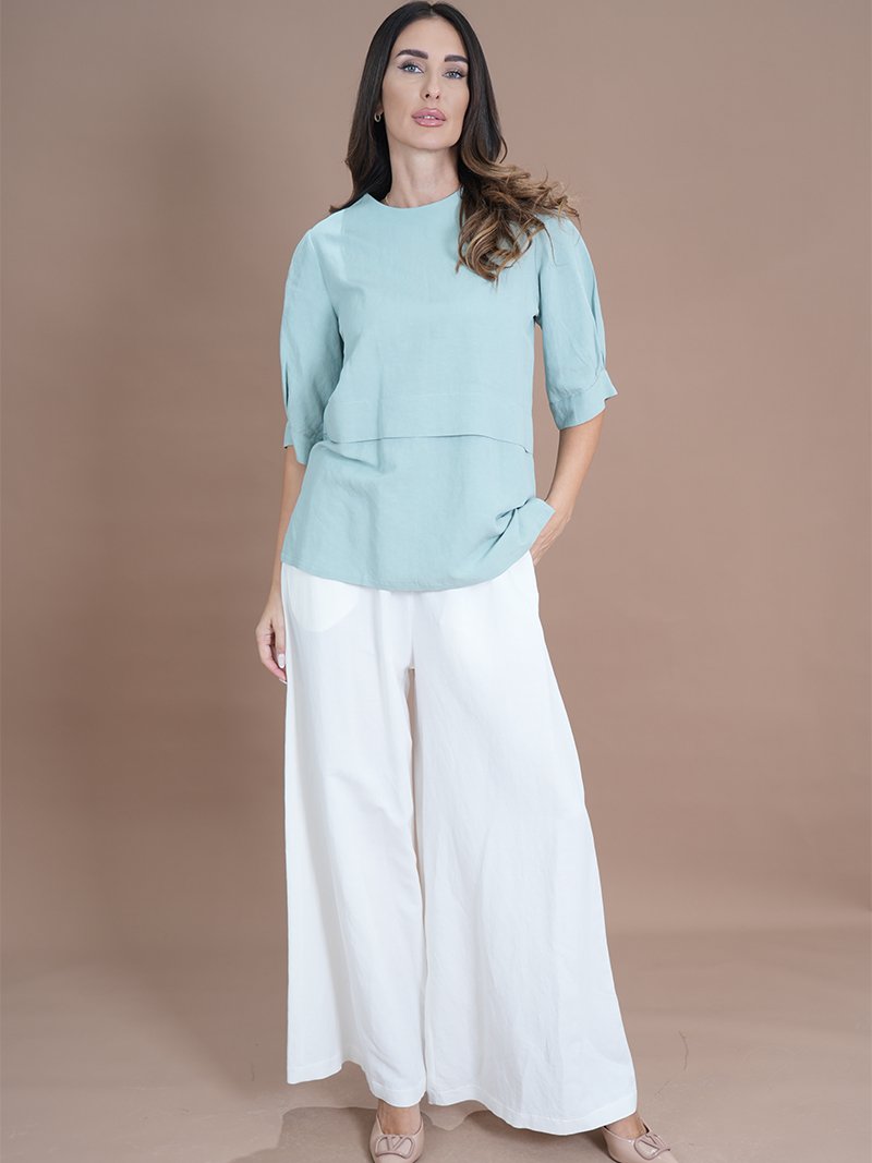 Seafoam green ensemble Layered fashion top Wide-leg trousers Casual chic outfit Day-to-evening wear Comfortable stylish clothing