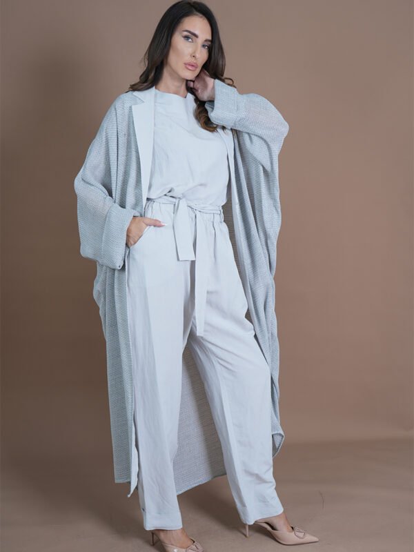 Grey textured abaya White tailored underpiece Versatile two-piece set Contemporary modest wear Customizable ensemble options